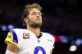 Los Angeles Rams quarterback Matthew Stafford is no stranger to high expectations. After leading his team to a Super Bowl victory, Stafford has once again become a central figure in the MVP conversation. This resurgence has reignited excitement across Los Angeles, marking a new chapter in his remarkable career. For the veteran passer, simply being mentioned among the league’s elite is not taken for granted. Stafford’s recent performances have showcased precision, resilience, and leadership. Despite battling injuries in previous seasons, his current form has placed him back in the national spotlight. When asked about being in the MVP mix, Stafford expressed humility and gratitude, noting that such recognition reflects not just his play but the collective effort of the entire Rams roster. He emphasized that while personal awards are gratifying, winning games and helping the team reach the postseason remain his top priorities. A Veteran’s Drive and Resilience Over the years, Stafford has built a reputation for toughness. Few quarterbacks have faced as many setbacks yet continued to perform at a high level. His ability to stand tall in the pocket, deliver accurate throws under pressure, and lead game-winning drives has made him a respected figure among teammates and fans alike. This season, his numbers tell the story of a player who has rediscovered his rhythm. His connection with young receivers has breathed new life into the Rams’ offense, while his command of the field has brought balance and consistency. Each performance seems to remind critics why Stafford remains one of the most skilled and mentally resilient quarterbacks in the NFL. What truly separates him, however, is his unwavering work ethic. Even in his mid-thirties, Stafford continues to study film, refine his mechanics, and find ways to elevate his teammates. For a quarterback who has seen nearly everything in the league, staying motivated is a testament to his deep love for the game. Leadership Beyond Statistics While MVP discussions often revolve around passing yards and touchdowns, Stafford’s influence extends far beyond numbers. His leadership in the locker room has become a cornerstone of the Rams’ culture. Younger players often speak about how Stafford’s calm demeanor and competitive spirit inspire confidence, especially during tough stretches of the season. He is known for keeping his teammates focused on the bigger picture — winning as a unit. Stafford frequently credits the offensive line, receivers, and coaching staff for his success, underscoring his team-first mentality. This humility, combined with his ability to execute under pressure, strengthens his case as one of the league’s most valuable players both on and off the field. Rams’ Resurgence Fuels Stafford’s MVP Bid The Rams’ improved performance has only amplified Stafford’s MVP chances. The team’s offensive efficiency has increased significantly, and much of that credit goes to his decision-making. Stafford’s precise timing, deep-ball accuracy, and adaptability against different defenses have made Los Angeles a tough opponent for any team. As the season progresses, every win strengthens his standing in the MVP race. With the Rams pushing toward playoff contention, Stafford’s leadership and composure are proving invaluable. Analysts and fans alike have noticed his renewed spark, one reminiscent of the energy that fueled the Rams’ championship run a few years ago. What an MVP Would Mean For Stafford, winning the MVP would be a personal milestone but also a symbol of perseverance. After years of battling through injuries and playing for rebuilding teams earlier in his career, this recognition would validate his longevity and determination. He acknowledged that the award would mean a great deal, representing the culmination of years of hard work, sacrifice, and dedication to his craft. However, he remains grounded. Stafford insists that team success outweighs individual accolades. His focus is firmly on keeping the Rams competitive and building momentum for the postseason. Yet, as his performances continue to turn heads, the possibility of him hoisting an MVP trophy becomes more realistic with each passing week. The Legacy in Progress Matthew Stafford’s career has already been defined by resilience, skill, and leadership. But this MVP conversation adds another compelling layer to his legacy. Whether or not he captures the award, his journey serves as an inspiring example of perseverance and excellence. As the season unfolds, Stafford’s composure, intelligence, and passion continue to define him. His story is not just about statistics or awards — it’s about a quarterback who refuses to fade quietly into the background. For Rams fans, seeing their leader in MVP talks once again feels like validation that the best is yet to come.